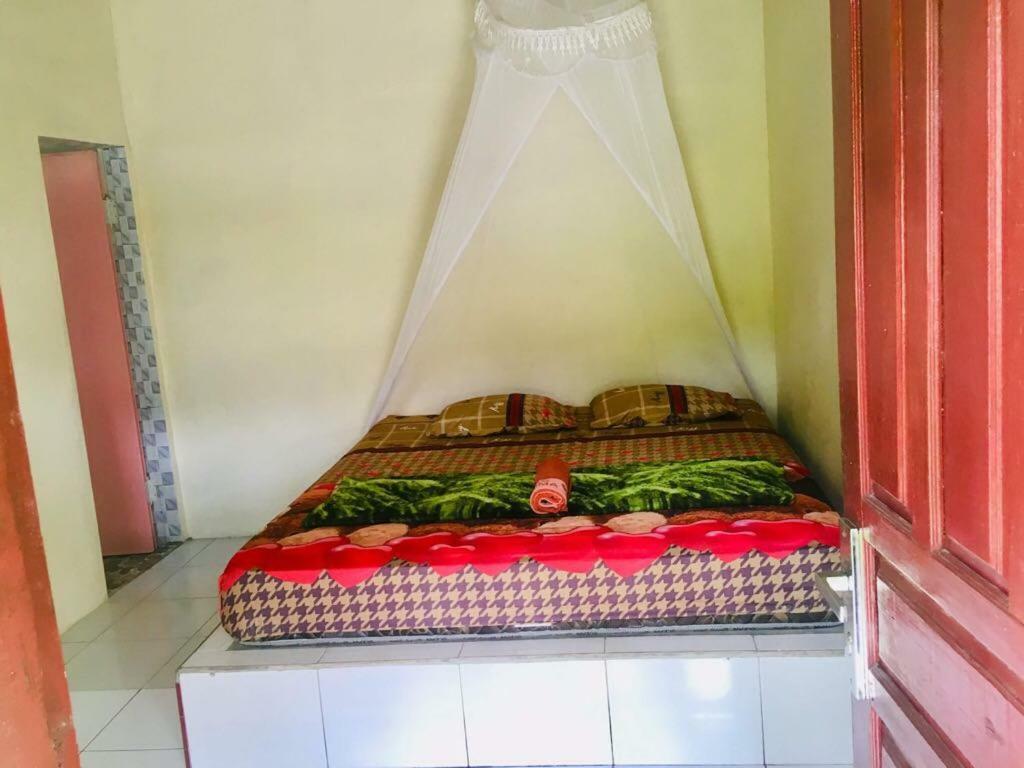 Sahnan Guest House Букит-Лаванг Экстерьер фото